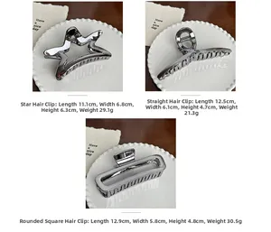 Detailed view of large silver metal hair claws in star and rectangle geometric shapes