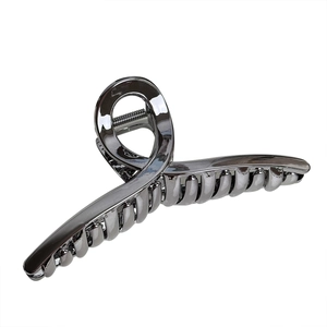 Glossy silver metal hair claw clip with cross-twist design for women hair styling