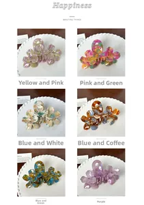 Detailed grid of six floral claw clips with acetate marble texture and rhinestones