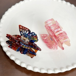 Pinces à cheveux papillon élégantes avec motif écaille et dégradé de rose en acétate