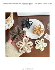 Macro detail of frosted flower hair claw clips in five elegant Morandi colors