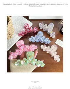 Macro detail of multicolored acetic acid flower hair claws with marble texture and dimensions