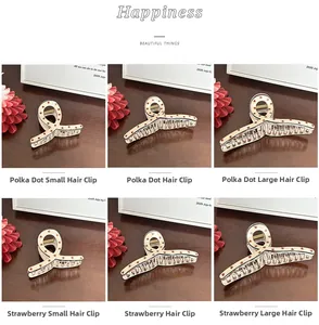 French style red polka dot and strawberry claw clips in small, medium, and large sizes
