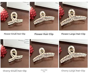 French style floral and cherry print hair claws in various sizes on a wooden background