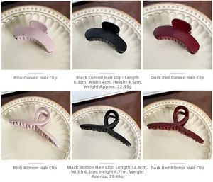 Detailed view of matte large shark hair claws in various sizes and elegant colors