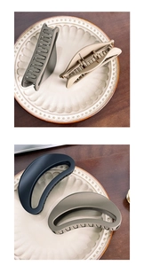 Detail view of large matte French shark clips showing durable teeth and spring for thick hair