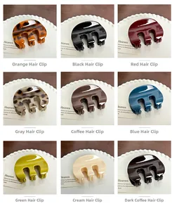 Selection of glossy resin hair claw clips in nine vibrant colors for elegant styling