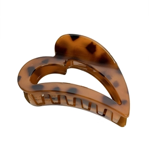 Minimalist heart-shaped hair claw clip with tortoise shell pattern for women styling