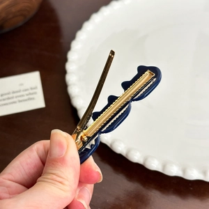Navy blue scalloped edge acetate hair clip with gold metal alligator grip accessory