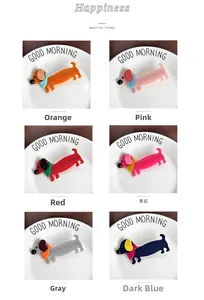 Set di mollette per capelli a forma di bassotto in colori arancio, rosa, rosso e blu