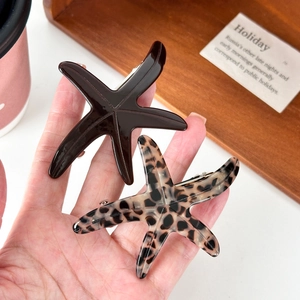 Chic starfish acetate hair clips in solid dark brown and leopard patterns for women