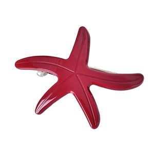 Creative red starfish acetate hair clip with shiny finish and silver metal spring clip