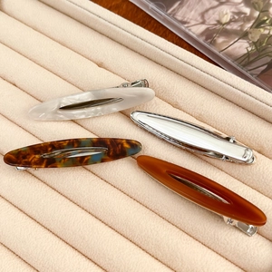 Lot de 4 barrettes ovales en acétate au design minimaliste marbré et écaille de tortue