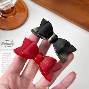 Lot de barrettes nœuds en acétate fait main en rouge vif et texture écaille de tortue