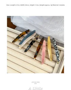 Detail view of acetate barrette hair clips in various colors with size 6.7x0.8cm
