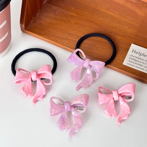 Pink and purple marble acetate bow hair clip and elastic tie set for elegant hairstyling