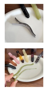 Detailed view of colorful jelly texture duckbill hair clips with secure inner grip teeth