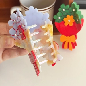 Pince à cheveux en acétate avec fleurs, strass et motifs marbrés colorés