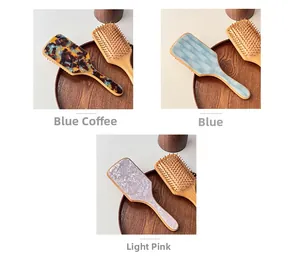 Detailed macro view of acetate air cushion massage combs in three textured patterns