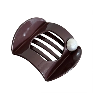 Classic dark brown resin shark hair claw clip with white faux pearl embellishment