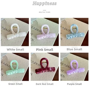 Detail of 6-color bow hair claw clip set in pastel shades for various hair styles