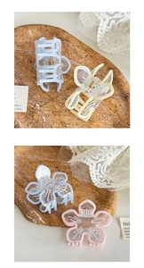 Détails des pinces à cheveux pastel en forme de fleur et papillon sur socle en pierre