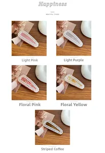 Detail view of five pearl acetate hair clips in assorted pastel colors on a wooden background