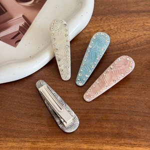 Set of 4 acetate water-drop hair clips with feather texture and rhinestone accents