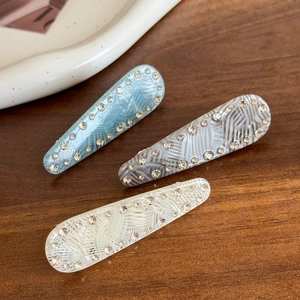 Three-piece set of acetate duckbill hair clips with marble texture and diamond borders