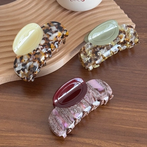 Three-piece set of luxury acetate shark hair clips in tortoiseshell and floral patterns