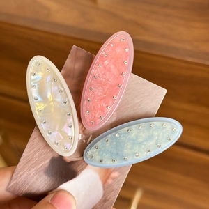 Three-piece jelly color duckbill hair clips set with sparkling rhinestones and pearl finish