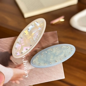 Sweet jelly-colored jelly hair clips with sparkling rhinestones in cream and light blue tones