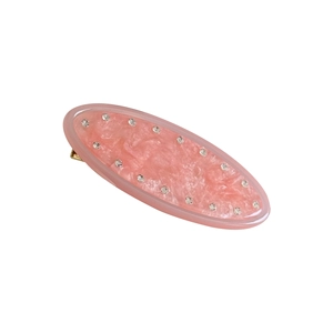 Pink marble resin hair clip with shiny crystal rhinestones and gold metal base