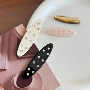 Elegant rhinestone acetate hair clips for women in black white and pink oval shapes