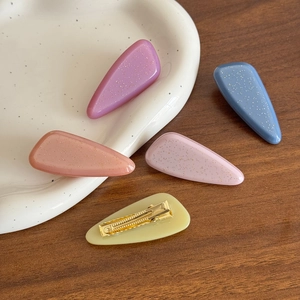 Set of five glitter acetate teardrop hair clips in pastel candy colors for women