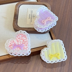 Three-piece set of heart-shaped acetate hair claws with lace edges and ribbons