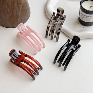 Minimalist jelly hair claw clips in assorted marble and solid colors for women