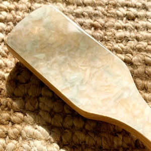 Acetate wide tooth paddle hairbrush with cream green marble pattern and wooden handle