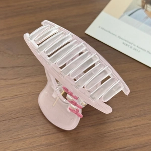 Pince à cheveux rose translucide effet gelée avec petit lapin et perles sur bois