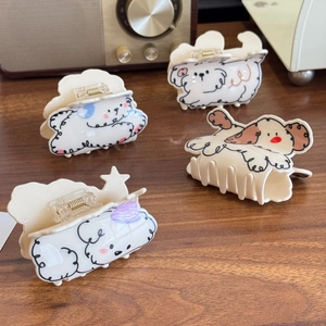 Lot de quatre pinces à cheveux chiots mignons en crème avec des motifs colorés