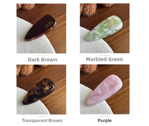 Set of 4mm thick acetate drop-shaped hair clips with French gold labels and marble textures