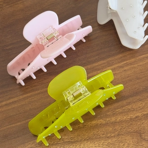 Set of large acetate hair claws in pink, green, and white with elegant rhinestone accents