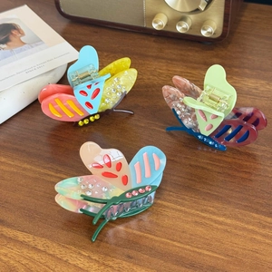Elegant acetate butterfly hair clips with crystals in colorful contrasting shades