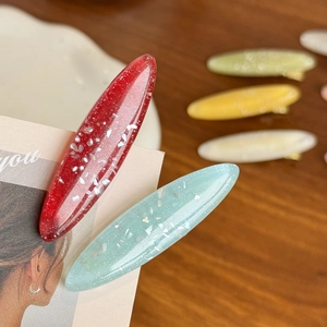 Elegante ovale Acetat-Haarspangen mit schimmernder Muschel-Textur in bunten Farben