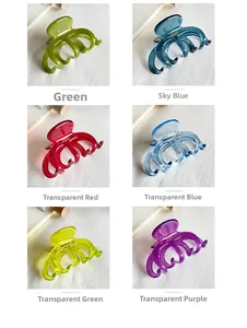 Detail of high-quality acetate hair claws in various glossy colors for elegant styling