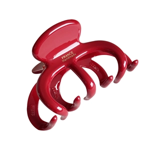 Deep red acetic acid pumpkin hair claw with polished finish and gold France Handmade logo