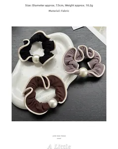 Detailed size view of pearl fabric scrunchies with dimensions and weight specs