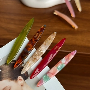 Elegant French handmade acetate hair clips set in marble and vintage patterns