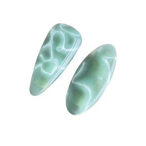 Elegant set of two light green marble texture acetate hair clips for women