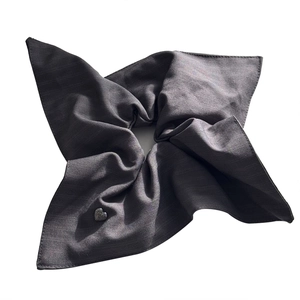 Dark grey satin striped scrunchie featuring a silver heart-shaped metal pendant charm